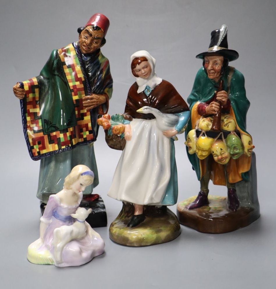 Four Royal Doulton figures, Carpet Seller, Mask Seller, Country Lass, Mary had a Little Lamb